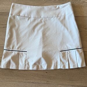 Chic Cream Mini Skirt with Black Trim